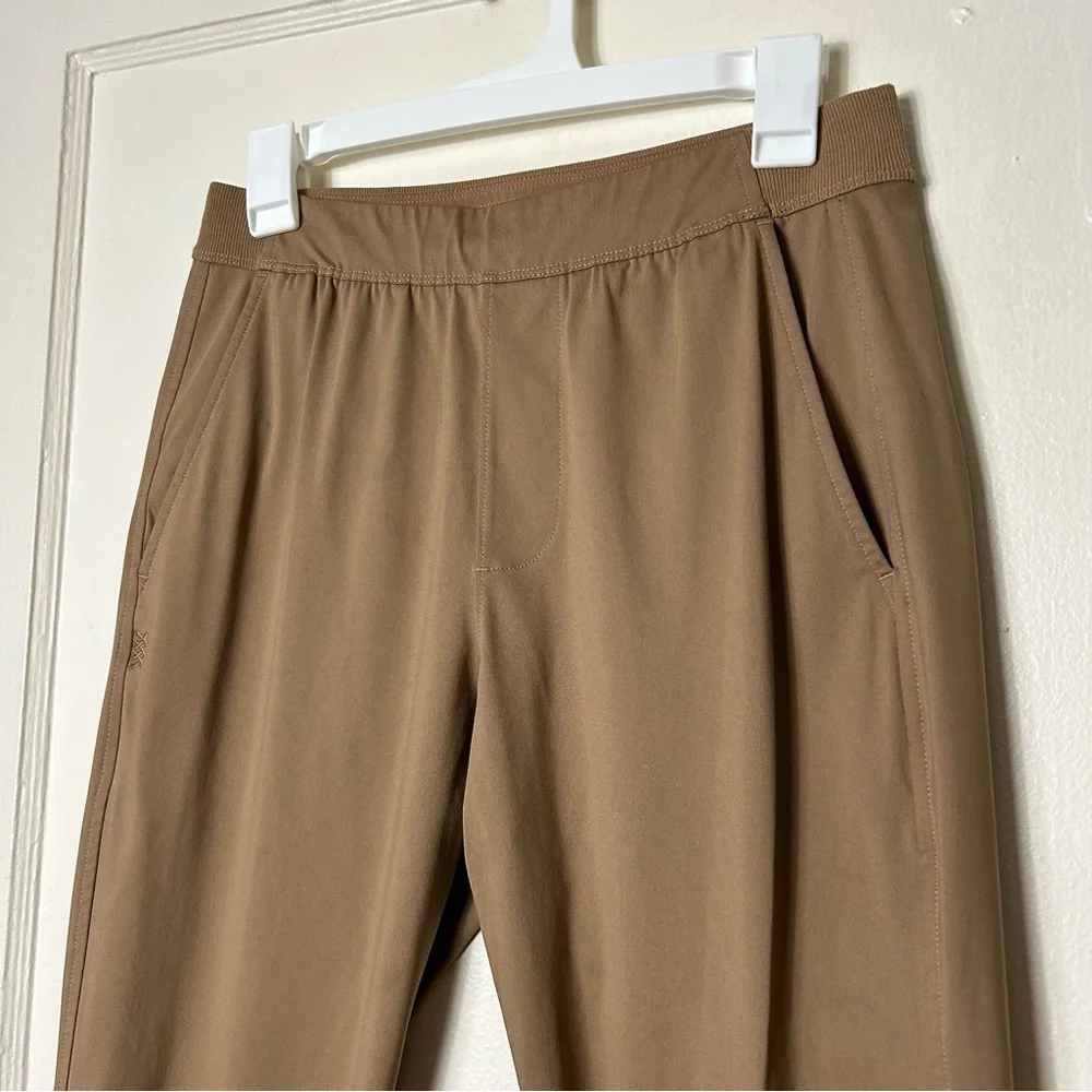 Rhone tan commuter performance joggers men's S pull on drawstring